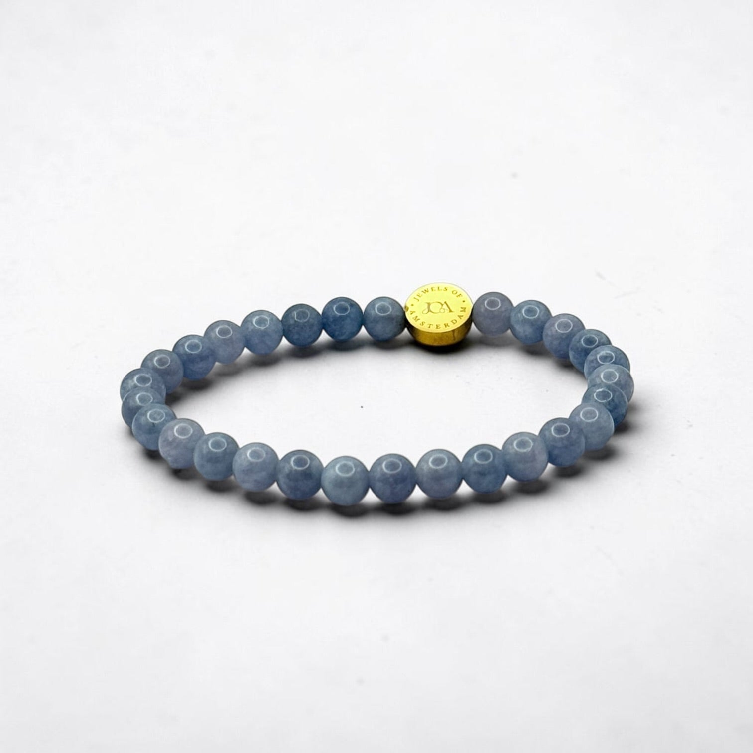 blauwe chalcedoon armband met gouden afwerking