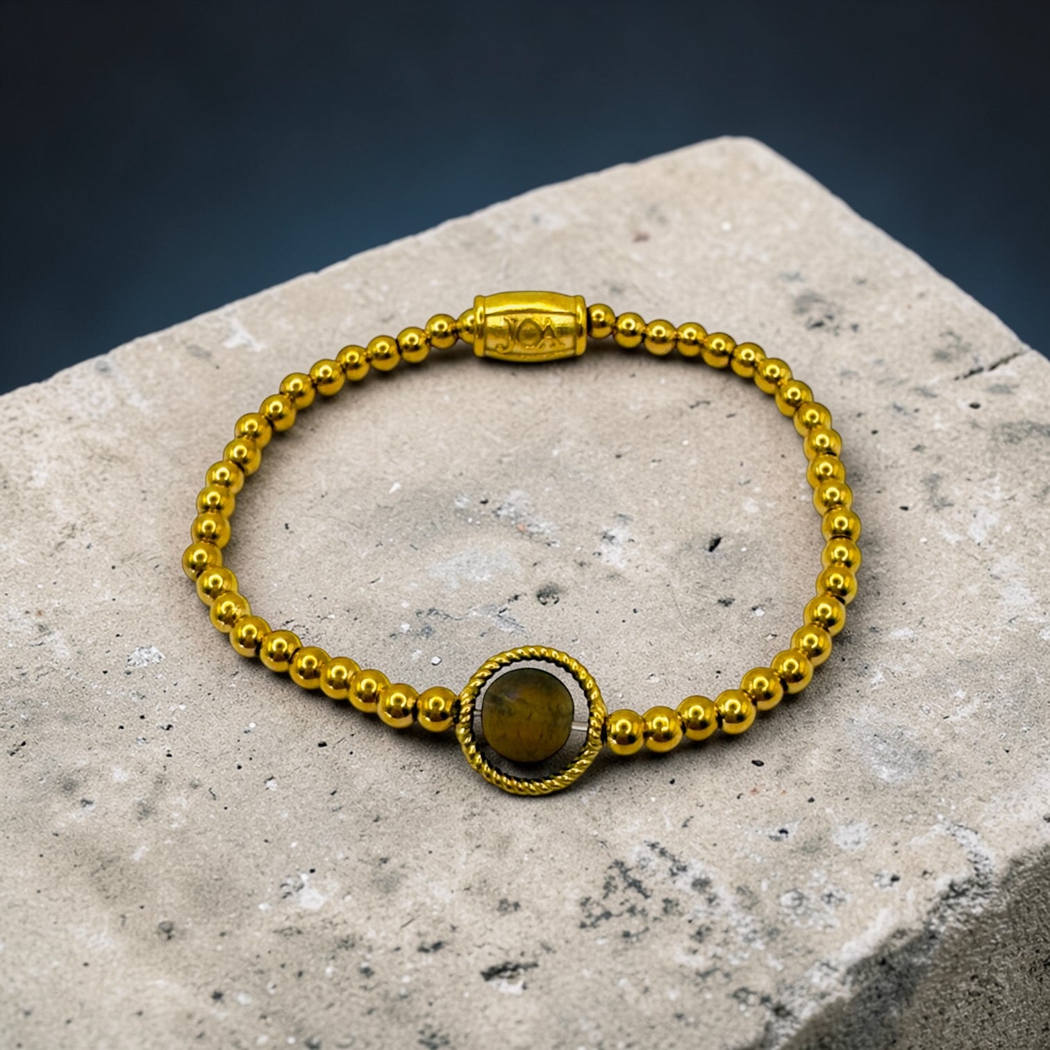 Gouden stainless steel dames armband met tijgeroog edelsteen