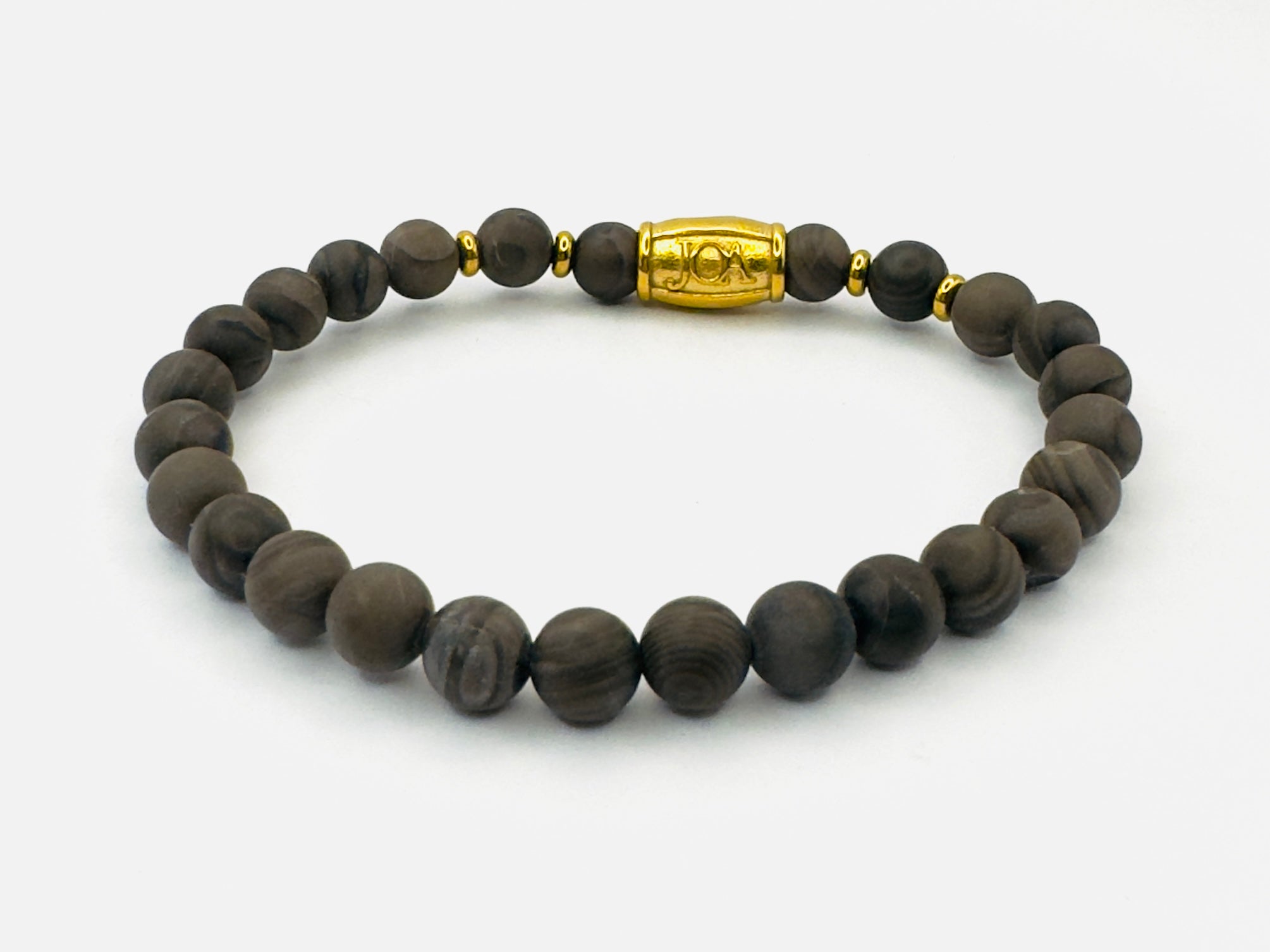 dames versteend hout armband goud