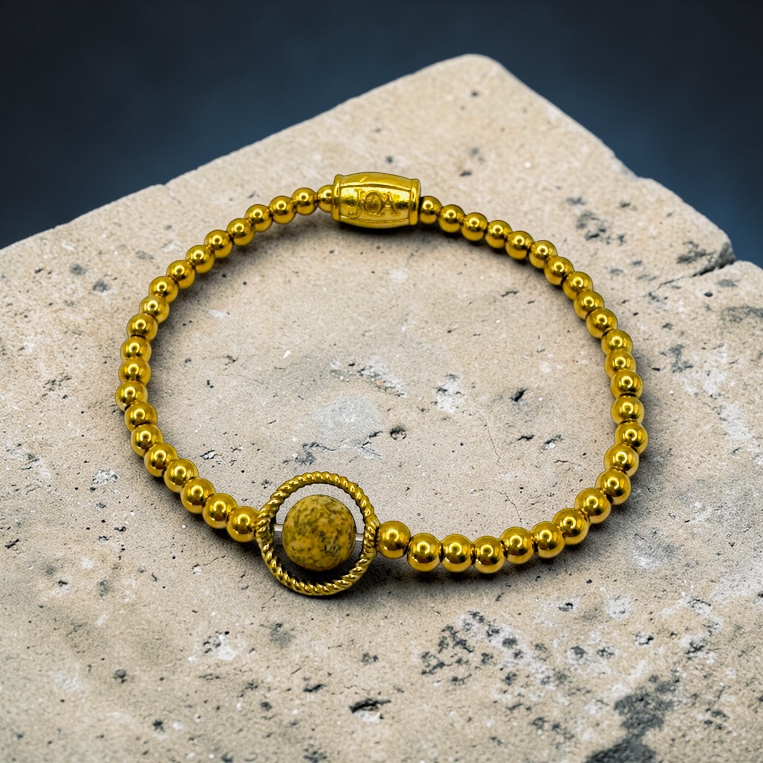Gouden stainless steel dames armband met picture jaspis edelsteen
